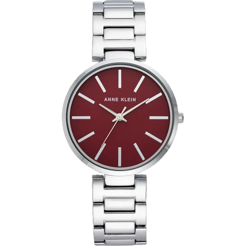 Model ANNE KLEIN 34mm AK-2787BYSV to elegancki zegarek, który przyciąga uwagę głębokim bordowym kolorem tarczy, kontrastującym z chłodnym blaskiem srebrnej bransolety. Minimalistyczny design tarczy z delikatnymi indeksami i wskazówkami podkreśla nowoczesny charakter tego modelu. Koperta o średnicy 34 mm idealnie nadaje się na kobiecy nadgarstek, oferując równowagę między subtelnością a wyrazistością. Mechanizm kwarcowy zapewnia precyzję i niezawodność działania. Model AK-2787BYSV jest doskonałym wyborem na codzienne stylizacje, ale równie dobrze sprawdzi się jako wyrafinowany dodatek na specjalne okazje.