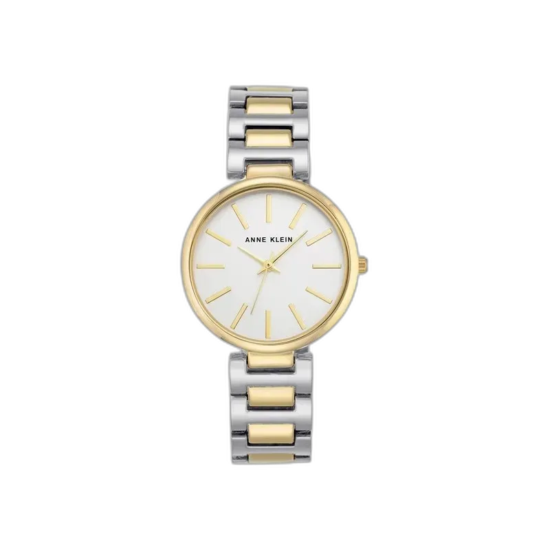 Model ANNE KLEIN 34mm AK-2787SVTT to klasyczny zegarek o subtelnym i eleganckim designie, idealny dla kobiet ceniących ponadczasowy styl. Srebrno-złota bransoleta harmonizuje z białą tarczą, na której delikatnie wyróżniają się złote indeksy oraz smukłe wskazówki. Koperta o średnicy 34 mm doskonale dopasowuje się do nadgarstka, zapewniając wygodę noszenia. Zegarek wyposażony jest w precyzyjny mechanizm kwarcowy, który gwarantuje niezawodność. Model AK-2787SVTT świetnie sprawdzi się zarówno w codziennych stylizacjach, jak i podczas bardziej formalnych okazji, dodając wyrafinowanego akcentu każdemu outfitowi.