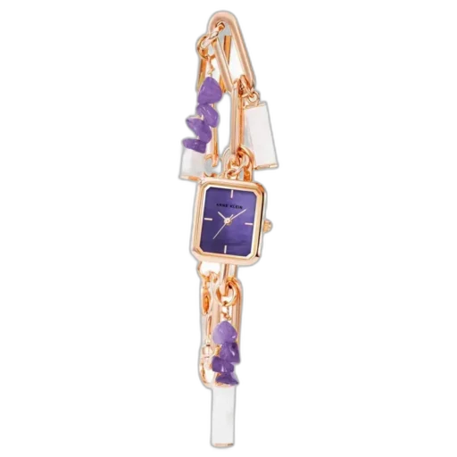 Model ANNE KLEIN CLASSIC 18MM AK-4108AMCH to niezwykle stylowy zegarek, który wyróżnia się artystycznym designem. Koperta o wymiarach 18 mm wykonana w odcieniu różowego złota idealnie współgra z fioletową tarczą, nadając zegarkowi wyrafinowanego charakteru. Zdobienia w formie kamieni i zawieszek dodają mu unikalnego wyglądu, przypominając bardziej bransoletkę niż tradycyjny zegarek. Idealny wybór dla osób poszukujących elegancji z nutą oryginalności.