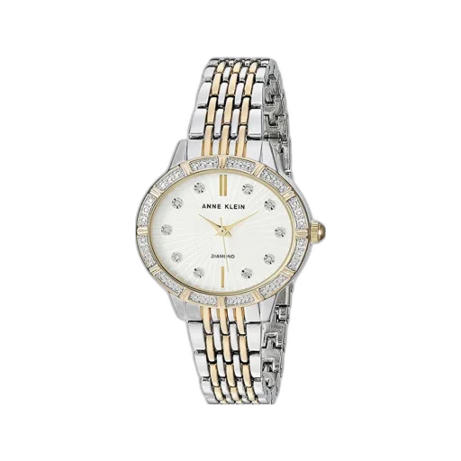 Model ANNE KLEIN 32MM AK-2783SVTT to klasyczny zegarek z subtelnymi, eleganckimi detalami, który doskonale uzupełni każdą stylizację. Tarcza w kolorze srebrnym ozdobiona została błyszczącymi indeksami, a dodatkowo obramowana pierścieniem zdobionym cyrkoniami, które nadają zegarkowi wyjątkowego blasku. Dwukolorowa bransoleta (srebro i złoto) wykonana z wysokiej jakości materiałów podkreśla luksusowy charakter modelu. Idealny dla kobiet ceniących styl i funkcjonalność w jednym akcesorium.