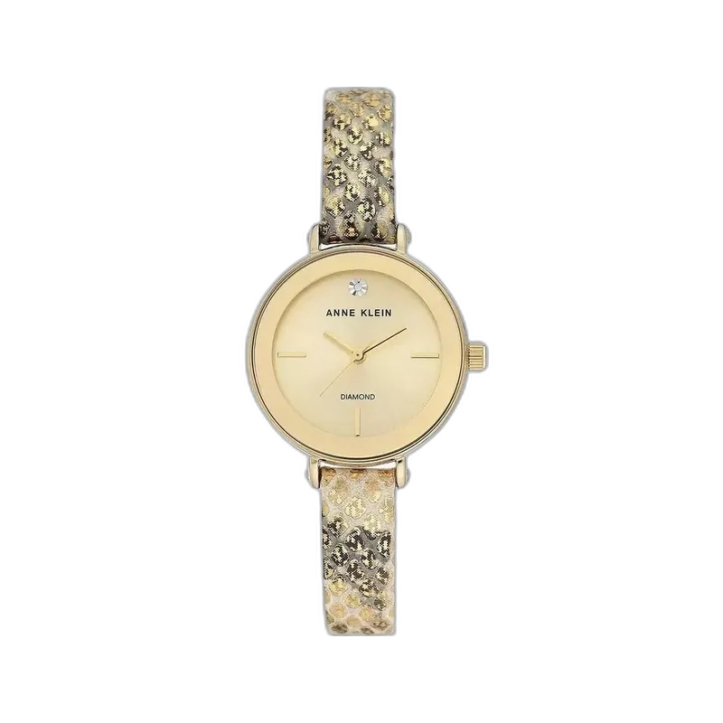 Model ANNE KLEIN 30MM AK-3508CHGD to wyjątkowy zegarek damski łączący elegancję i oryginalność. Tarcza w złotym kolorze, ozdobiona subtelnym diamentem na godzinie 12, podkreśla ekskluzywny charakter zegarka. Pasek o fakturze skóry w złote wzory dodaje niepowtarzalnego stylu i wyróżnia ten model na tle innych. To idealne akcesorium dla kobiet ceniących luksus i unikalny design w codziennym stylu.