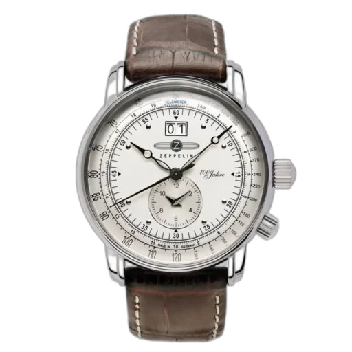 Wyrafinowany zegarek Zeppelin 100 Jahre 7640-1 z jasną tarczą, wyraźnymi wskazówkami i dużym okienkiem datownika. Elegancka stalowa koperta w połączeniu z brązowym skórzanym paskiem podkreśla ponadczasowy styl i niemiecką precyzję tej jubileuszowej edycji.