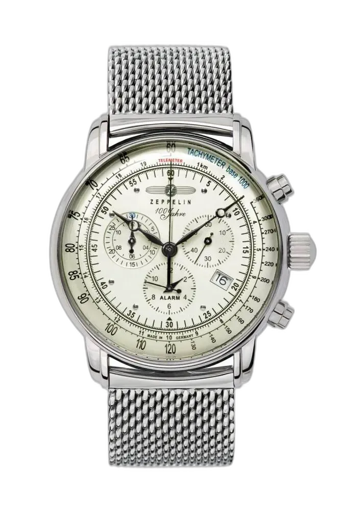 Klasyczny zegarek Zeppelin 100 Jahre 8680M-3 z jasną tarczą i srebrnym bransoletkowym paskiem typu mesh. Wyposażony w tachymetr, alarm, chronograf oraz datownik, który dodaje funkcjonalności. Niemiecka precyzja i elegancja w wyjątkowym jubileuszowym designie. Idealny dla osób ceniących klasyczne i praktyczne rozwiązania.