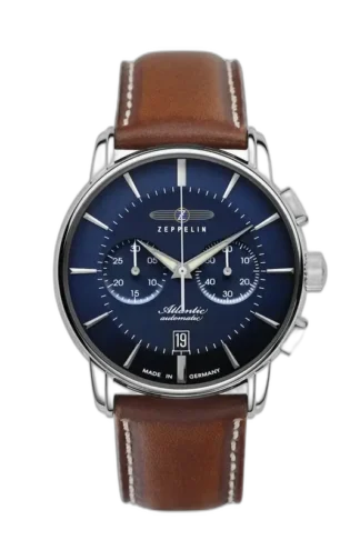Stylowy zegarek Zeppelin Atlantic 8422-3 Automatik Chronograph z głęboką niebieską tarczą i subtelnymi indeksami. Wyposażony w dwa chronografy, wskaźnik daty i stalową kopertę. Brązowy skórzany pasek z białymi przeszyciami dodaje elegancji. Wyprodukowany w Niemczech, ten automatyczny zegarek łączy nowoczesność z klasycznym designem.