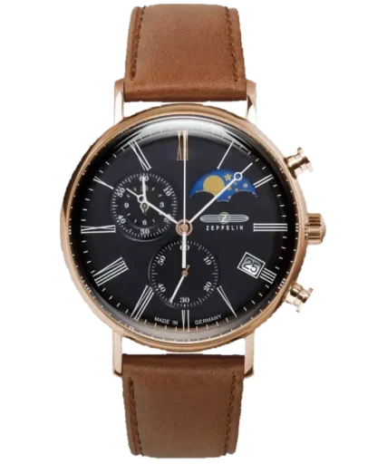 Elegancki zegarek Zeppelin LZ120 Rome 7196-2 z czarną tarczą, złotą kopertą i skórzanym, brązowym paskiem. Na tarczy znajdują się funkcje chronografu, wskaźnik faz księżyca oraz datownik na godzinie czwartej. Rzymskie cyfry oraz smukłe wskazówki podkreślają klasyczny styl. Mechanizm precyzyjnie działa, a niemiecka jakość wykonania zapewnia niezawodność i ponadczasowy wygląd.