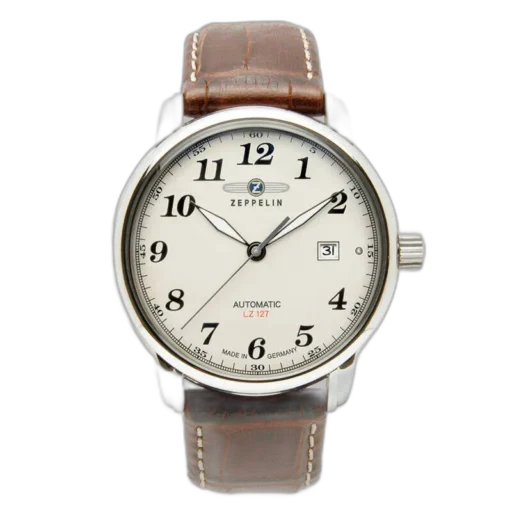 Elegancki zegarek Zeppelin LZ127 7656-5 Automatik z jasną tarczą i wyraźnymi cyframi arabskimi. Wyposażony w brązowy skórzany pasek z przeszyciami oraz okienko datownika na godzinie 3. Klasyczny design połączony z niezawodnym niemieckim mechanizmem automatycznym. Idealny wybór dla miłośników tradycyjnych czasomierzy.
