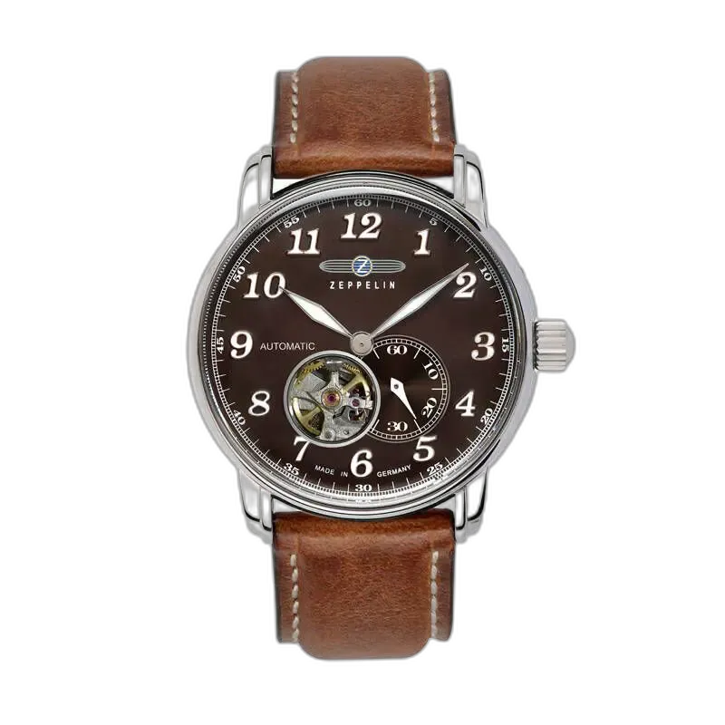 Stylowy zegarek Zeppelin LZ127 7666-4 z elegancką brązową tarczą, wyróżniającą się otwartym okienkiem ukazującym mechanizm automatyczny. Wyraźne, srebrne cyfry arabskie oraz klasyczne wskazówki nadają mu ponadczasowego charakteru. Pasek wykonany z wysokiej jakości brązowej skóry z białymi przeszyciami doskonale komponuje się z kopertą ze stali szlachetnej. Niemiecka precyzja i design w najlepszym wydaniu.