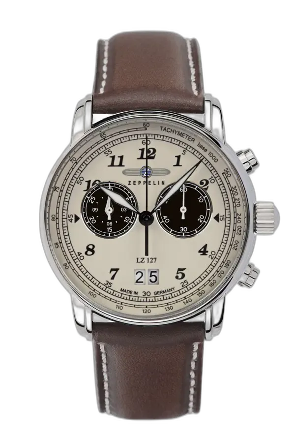 Elegancki zegarek męski Zeppelin LZ127 8684-5 Quartz z beżową tarczą i czarnymi subtarczami chronografu. Wyposażony w datownik na godzinie 6, brązowy skórzany pasek z białym przeszyciem oraz tachymetr na pierścieniu tarczy. Doskonałe połączenie klasyki i funkcjonalności, idealne na każdą okazję.