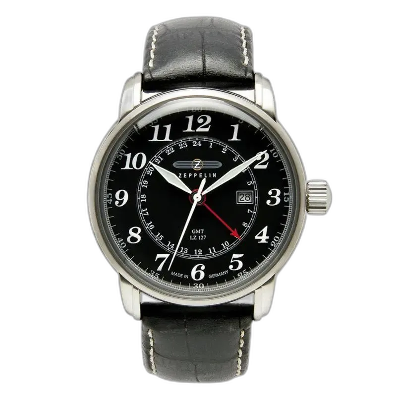 Stylowy zegarek Zeppelin LZ127 ZE-7642-2 z czarną tarczą i srebrną kopertą. Wyposażony w precyzyjny mechanizm GMT, umożliwiający odczyt czasu w dwóch strefach czasowych. Czarne, skórzane paski z kontrastowymi przeszyciami dodają elegancji, a białe cyfry i czerwony wskaźnik GMT ułatwiają odczyt godziny. Idealny wybór dla podróżników ceniących niemiecką jakość i ponadczasowy design.
