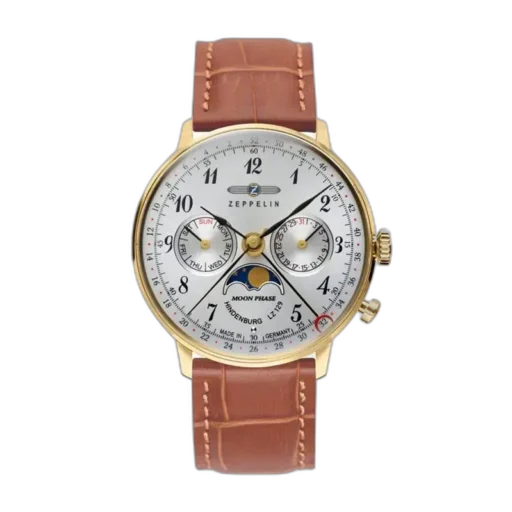 Zegarek Zeppelin LZ129 Hindenburg 7039-1 w eleganckiej złotej kopercie z funkcją faz księżyca i datownikiem. Biała tarcza z klasycznym układem sub-tarcz oraz stylowym, jasnobrązowym skórzanym paskiem o fakturze imitującej krokodylą skórę. Precyzyjne detale i wyrafinowane wzornictwo inspirowane lotniczą historią marki Zeppelin.
