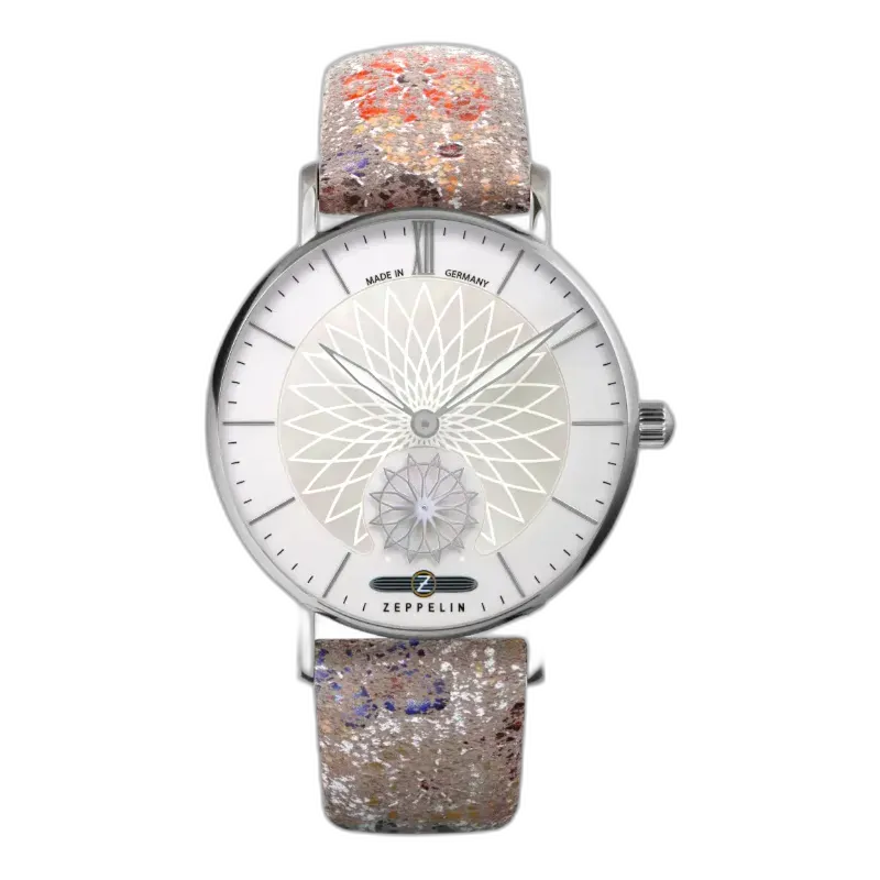Stylowy zegarek Zeppelin Mandala 8131-1, charakteryzujący się wyjątkową tarczą z motywem mandali w kolorze srebrnym. Wyjątkowy pasek z oryginalnym, artystycznym wzorem dodaje mu unikalnego charakteru. Perfekcyjne połączenie precyzji niemieckiej produkcji z niepowtarzalnym designem.
