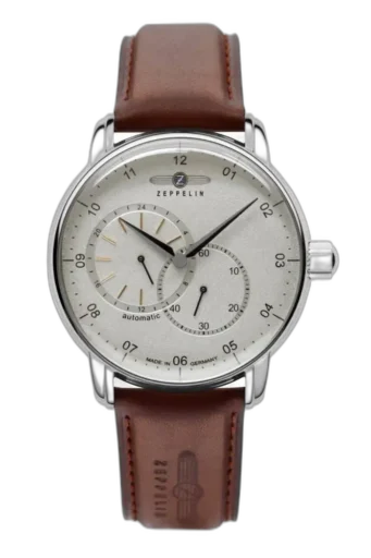 Zegarek Zeppelin New Captain’s Line 8662-1 Automat z jasną tarczą i minimalistycznym designem. Wyposażony w precyzyjny mechanizm automatyczny, sub-tarcze wskazujące czas 24-godzinny oraz sekundy. Stylowa stalowa koperta i brązowy skórzany pasek z wytłoczonym logo Zeppelin dopełniają elegancki wygląd tego klasycznego modelu.