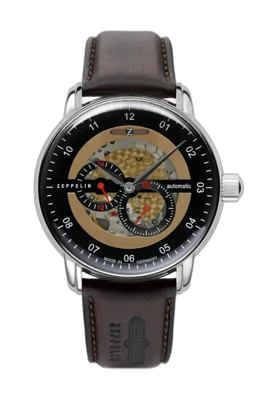 Męski zegarek Zeppelin New Captain’s Line 8664-5 Automatic z czarną tarczą typu skeleton, która ujawnia mechanizm automatyczny. Wyposażony w brązowy skórzany pasek z logo Zeppelin, wyprodukowany w Niemczech. Elegancja i precyzja w jednym.