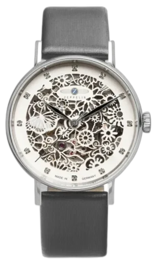 Elegancki zegarek Zeppelin Princess of the Sky 7461-1 z delikatnie zdobioną ażurową tarczą, ukazującą precyzyjne mechanizmy zegarka. Koperta wykonana ze stali szlachetnej oraz subtelne zdobienia kryształkami dodają luksusowego charakteru. Pasek w kolorze szarym doskonale komponuje się z designem tarczy, tworząc wyrafinowaną całość. Wyprodukowany w Niemczech, łączy estetykę z precyzją wykonania.